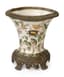 [NO RESERVE]
DECORATIVE CERAMIC AND BRASS VASE WITH POLYCHROME DECORATION OF BIRDS PERCHED AND NESTING AMONG THE FOLIAGE