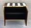 TWO-DOOR BLACK AND WHITE CABINET, CIRCA 1990S