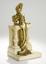 ERNEST WANTE (1872-1960)
Gilded bronze female figure leaning on a marble balcony