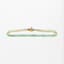 18K YELLOW GOLD TENNIS BRACELET WITH EMERALDS