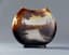 ART NOUVEAU STYLE VASE IN BROWN CAMEO
GLASS WITH LANDSCAPE DECORATION
(POSSIBLY KORNILOV FACTORY?)