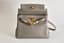 HERMÈS KELLY RETOURNÉ 28
GRAY TOGO LEATHER WITH GILT METAL HARDWARE
