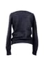 CHANEL BY KARL LAGERFELD
METIERS D’ART ‘PARIS – MOSCOW’ 2009
Pullover with an inscription in Cyrillic
‘Chanel’ and double-headed eagle buttons. Collector piece.