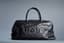 CHANEL
Black quilted caviar leather weekend travel bag