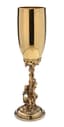 SILVER-GILT CHAMPAGNE FLUTE WITH ENGRAVED COAT OF ARMS AND BACCHANAL SCENE