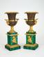 A PAIR OF RUSSIAN ORMOLU, PATINATED-BRONZE AND MALACHITE TWO-HANDED URNS
Circa 1840-1850
