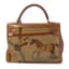 HERMÈS
LIMITED EDITION HERMÈS KELLY 32 RETOURNE ‘COUVERTURE ET TENUES DE JOUR’ , 2010