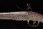 Flintlock pistol.