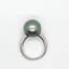 GREY PEARL RING
18k white gold ring set with one 24,5mm Tahitian pearl