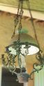 LUSTRE À PÉTROLE À NEUF LUMIÈRES EN BRONZE PATINÉ ET OPALINE BLEUTÉE
France, fin du 19ème siècle