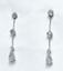 PAIR OF DIAMOND AND WHITE GOLD EARRINGS