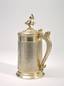 Silver-gilt tankard with a lid with a dancing peasant finial.
Russia, Saint Petersburg, 1863