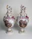 PAIR OF POSTSCHAPPEL LARGE POLYCHROME PORCELAIN COVERED VASES ADORNED WITH PERSONNAGES, FLOWER GUIRLANDS AND SCENES OF RIDERS
Germany, Postschappel, 20th century