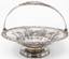 Fruit bowl with a handle, decorated with stylized floral ornaments.