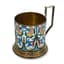 SOVIET SILVER-GILT AND ENAMEL TEA GLASS HOLDER
Leningrad Jewellery Factory, 1954