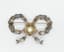 RIBBON DIAMOND BROOCH, 19TH CENTURY