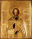 AN ICON 'SAINT SERGE OF RADONEZH' IN A
GILDED WOOD OKLAD