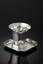 CARTIER SILVER CUP AND SAUCER, circa 1960s