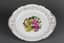A DECORATIVE PORCELAIN PLATE WITH AN ASIAN MOTIF, 20TH CENTURY