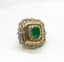 EMERALD AND DIAMOND RING (WITH CERTIFICATE)
Yellow gold ring set with one central emerald weighing 8 ct with diamond and emerald surrounds