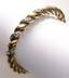 Twisted bangle
Gold set with sapphire and rose cut diamond 18k gold, Weight: 28,3 grs