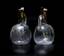 PAIR of crystal decanters for porto from the collection of Prince Demidov SAN - Donato
Crystal, silver English work, after 1838 Stamp on the neck: N.A., crown, lion, C, head turned to the left On the inside ...