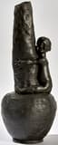 HANS STOLTENBERG LERCHE (1867-1920)
tin vase depicting a child seated on the belly