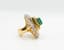 EMERALD AND DIAMOND RING (WITH CERTIFICATE)
Yellow gold ring set with one central emerald weighing 8 ct with diamond and emerald surrounds