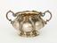 SILVER-GILT LOBED TEAPOT AND SUGAR
BOWL ADORNED WITH EMBOSSED FLORAL
DECOR
Assay master Mor Alexander Yakovlevich (1831-
1854) (?), workshop «ST», Russia, Moscow, 1851
(during reign of Nicholas I).