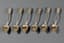 SET OF SIX SMALL SILVER-GILT SPOONS