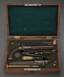 A pair of duelling pistols by Nicolas - Noel Bute, gunsmith of the emperor of France, in its original case with accessor...