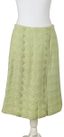 CHANEL
Tailleur jupe en tissu texturé vert d’eau