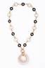 Andre Vassort, 1970 period. Onyx and Rock crystal pendant
Andre Vassort, 1970 period. Yellow gold pendant necklace made of onyx rings and festooned rock crystal set with diamond-...