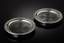A PAIR OF SILVER AND GLASS COASTERS