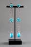DIAMOND, TOURQUOISE, AND WHITE GOLD EARCLIPS