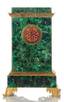MALACHITE EMPIRE STYLE MANTEL CLOCK
Russia, Imperial Lapidary factory of Peterhof, first quarter of the XIX century Bronze-gilt, malachite, mosaic 47,5 х 30...