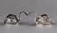 A PAIR OF VINTAGE SWAN SHAPED MENU HOLDERS