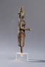 STATUETTE OF A GODDESS WEARING A ‘SARONG’ WITH AN APRON-LIKE FOLD AND A CONICAL HEADDRESS
CAMBODIA, ANGKORIAN PERIOD, ANGKOR WAT, 12TH CENTURY
