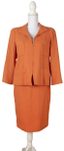 CHANEL BY KARL LAGERFELD SPRING 1996
Orange skirt suit