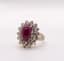 RUBY AND DIAMOND RING
18k white gold ring set with a 3,5 ct ruby cabochon surrounded by two sets of diamonds weighing approx. 1,8ct