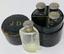 A SUITE OF FOUR JANE DERVAL ART DECO SILVER-MOUNTED SCENT BOTTLES WITH SILVER STOPPERS