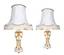 A PAIR OF ANTIQUE CARRARA MARBLE AND GILT BRONZE TABLE LAMPS
LOUIS XVI STYLE, FRANCE