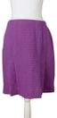 CHANEL
Tailleur jupe en tweed violet