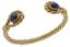 BRACELET JONC TORSADE EN OR JAUNE ET GRIS 18K, DIAMANTS ET SAPHIRS CABOCHON