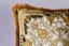 VERSACE PAIR OF BLACK AND GOLD BAROQUE VELVET CUSHIONS