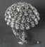 GOLD, PLATINUM AND APPROXIMATELY 10 CT. DIAMONDS FLOWER BROOCH