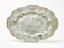 SILVER OVAL DISH DECORATED WITH FOUR CARTOUCHES WITH THE IMAGE OF PLAYING PUTTI.
Master Grigory Lakomkin, Russia, Moscow, circa 1740.