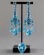 18K WHITE GOLD GIRANDOLE EARRINGS SET AND RING WITH IMPORTANT BLUE TOPAZES