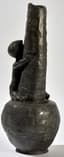 HANS STOLTENBERG LERCHE (1867-1920)
tin vase depicting a child seated on the belly