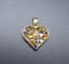 GOLD HEART PENDAND
18k yellow gold heart-shaped pendant with coloured stones